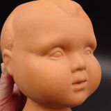 Vase in the shape of a baby's head - poupon