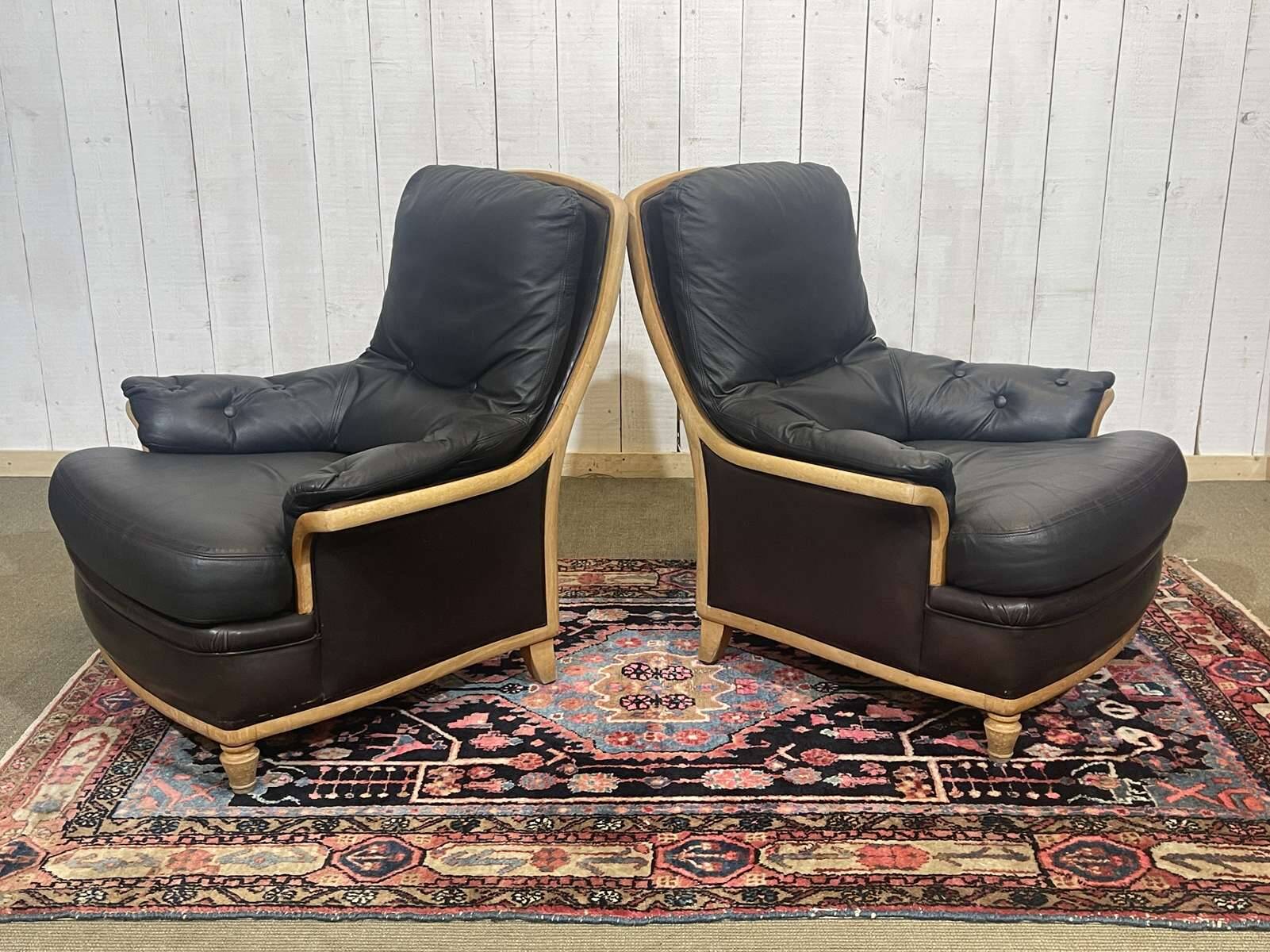 Pair of leather and beech armchairs from the 1970s.