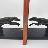 Pair of bookends, greyhounds in babbitt on black marble, Art Deco early 20th century