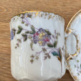 Porcelain cup with earthenware lions