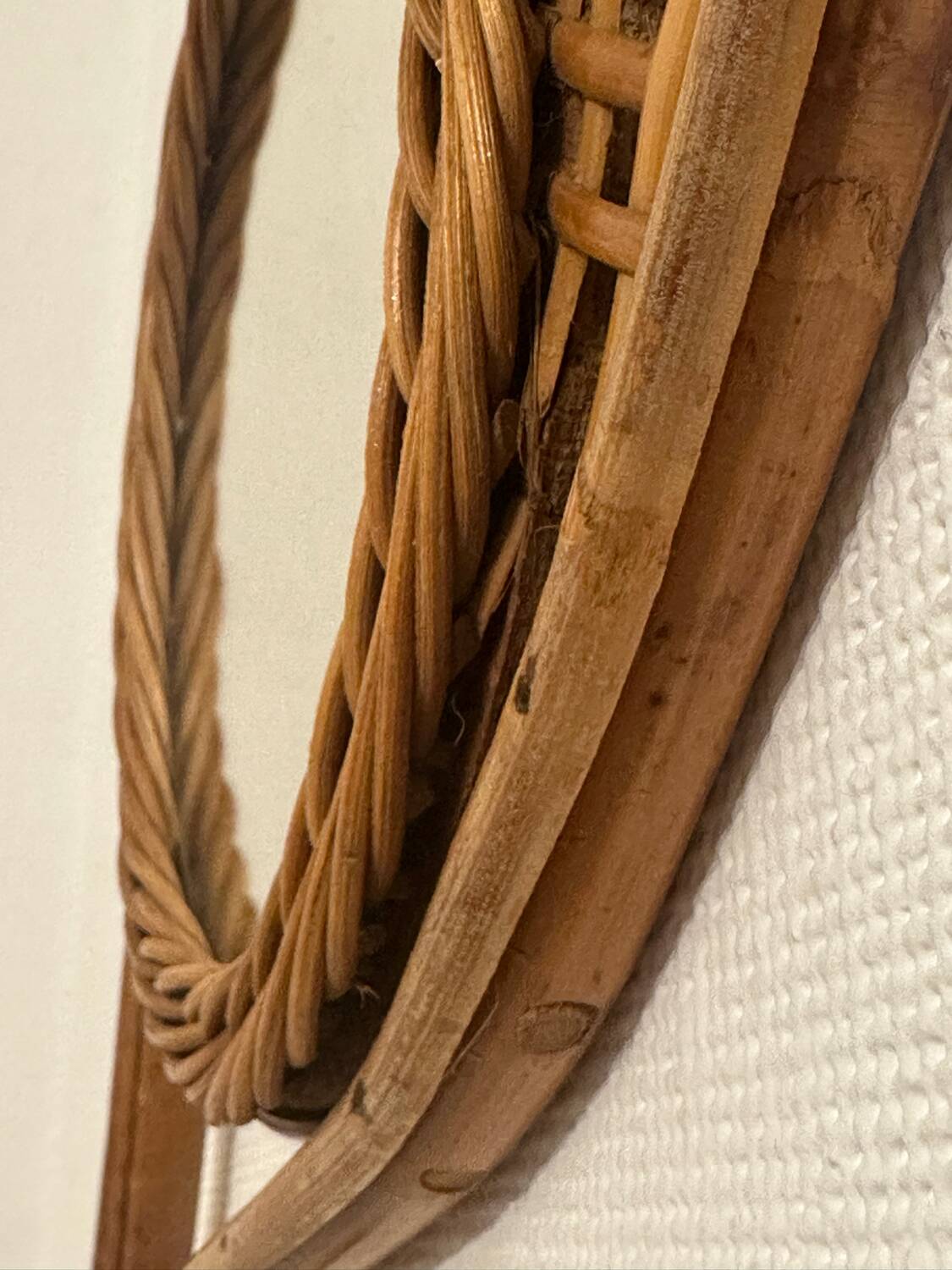 Vintage rattan tennis racket mirror