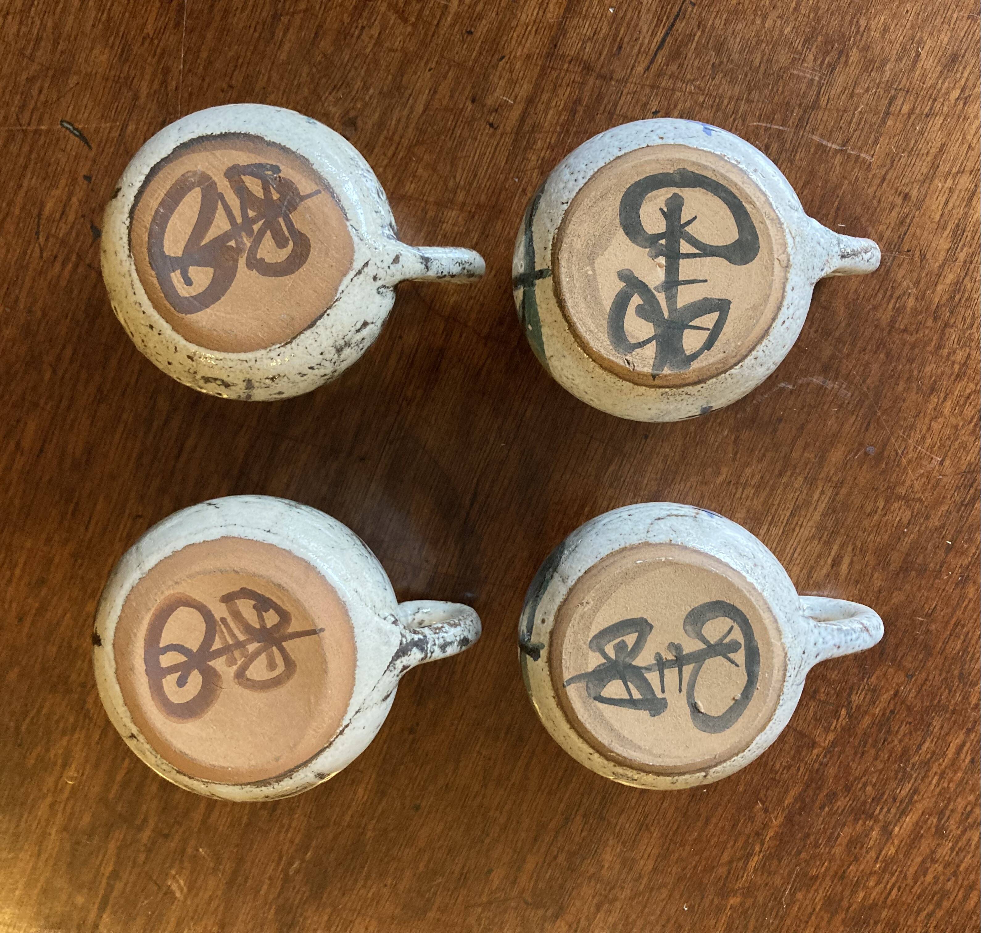 Ensemble de quatre tasses à café. Gustave Reynaud.