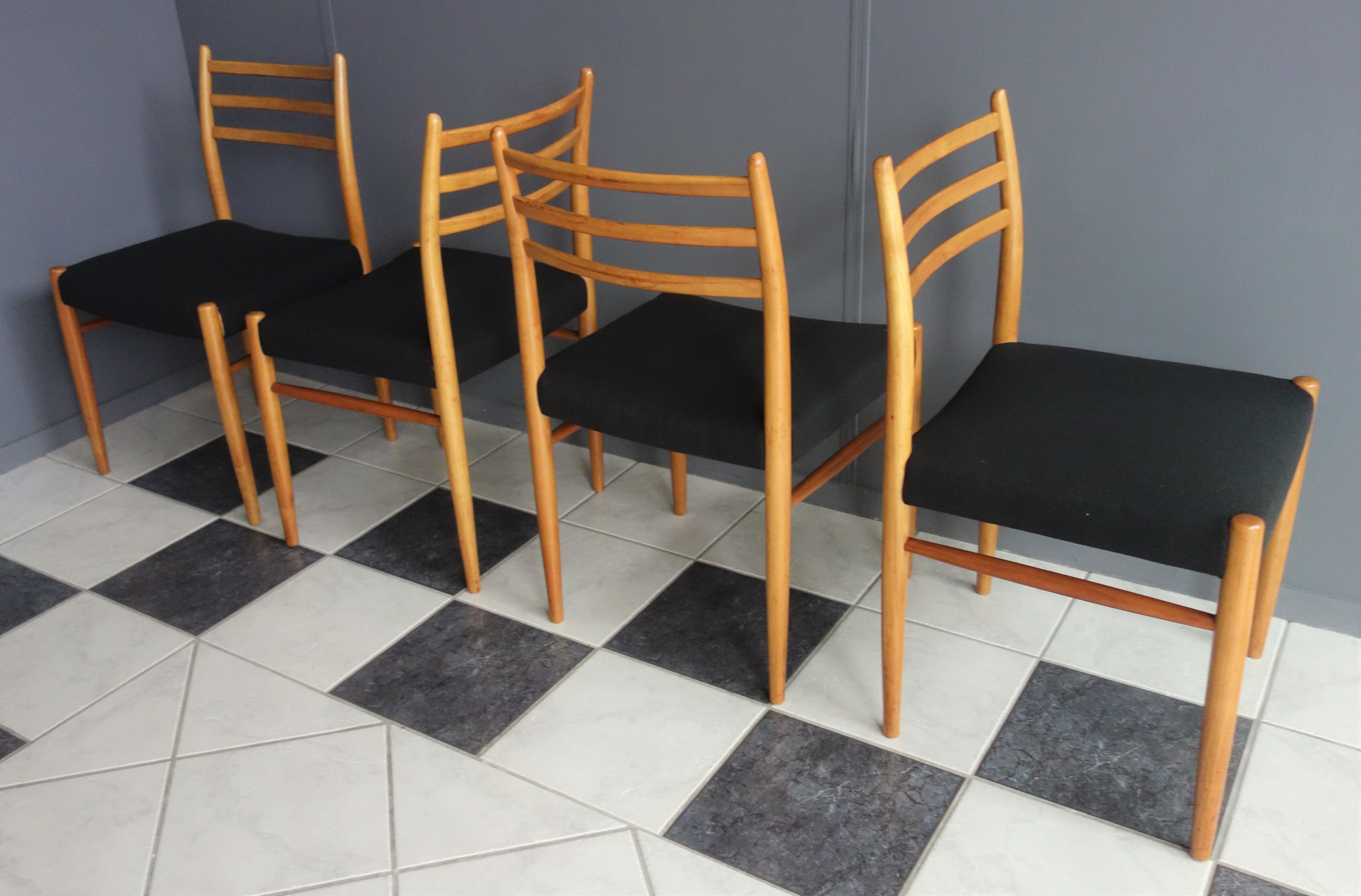 Set of 4 dining chairs in wood and black fabric 1960s