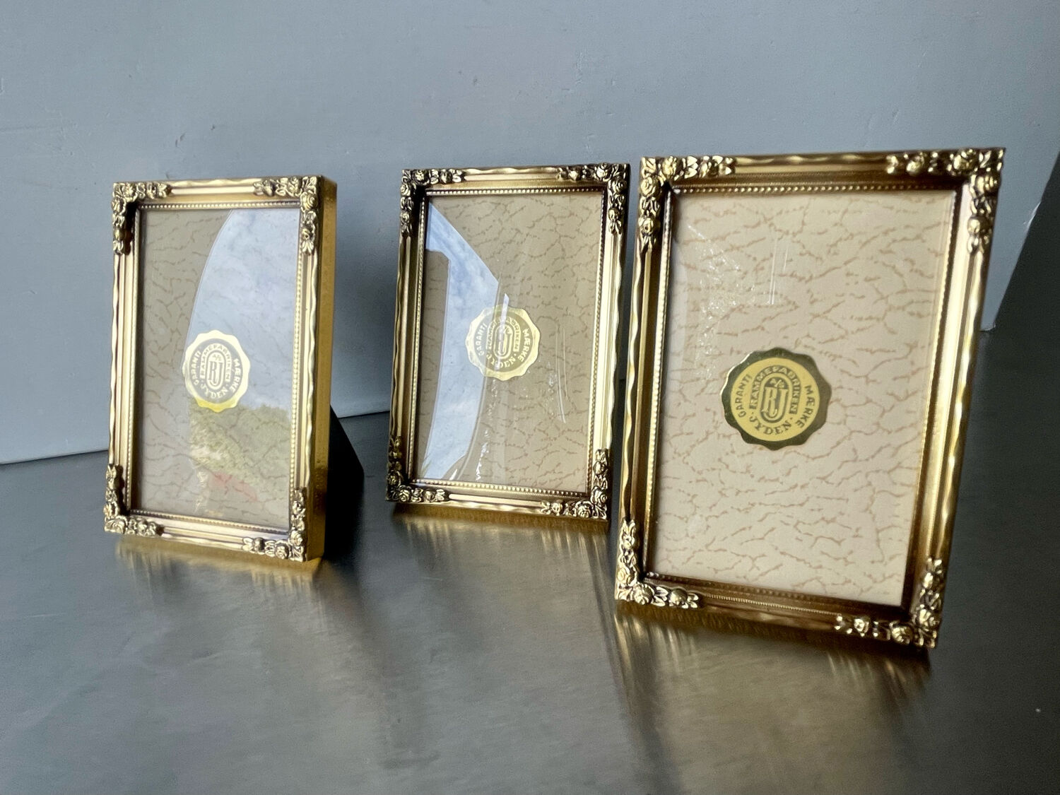 Set of 3 vintage identical gold colored metal picture frames convex glass