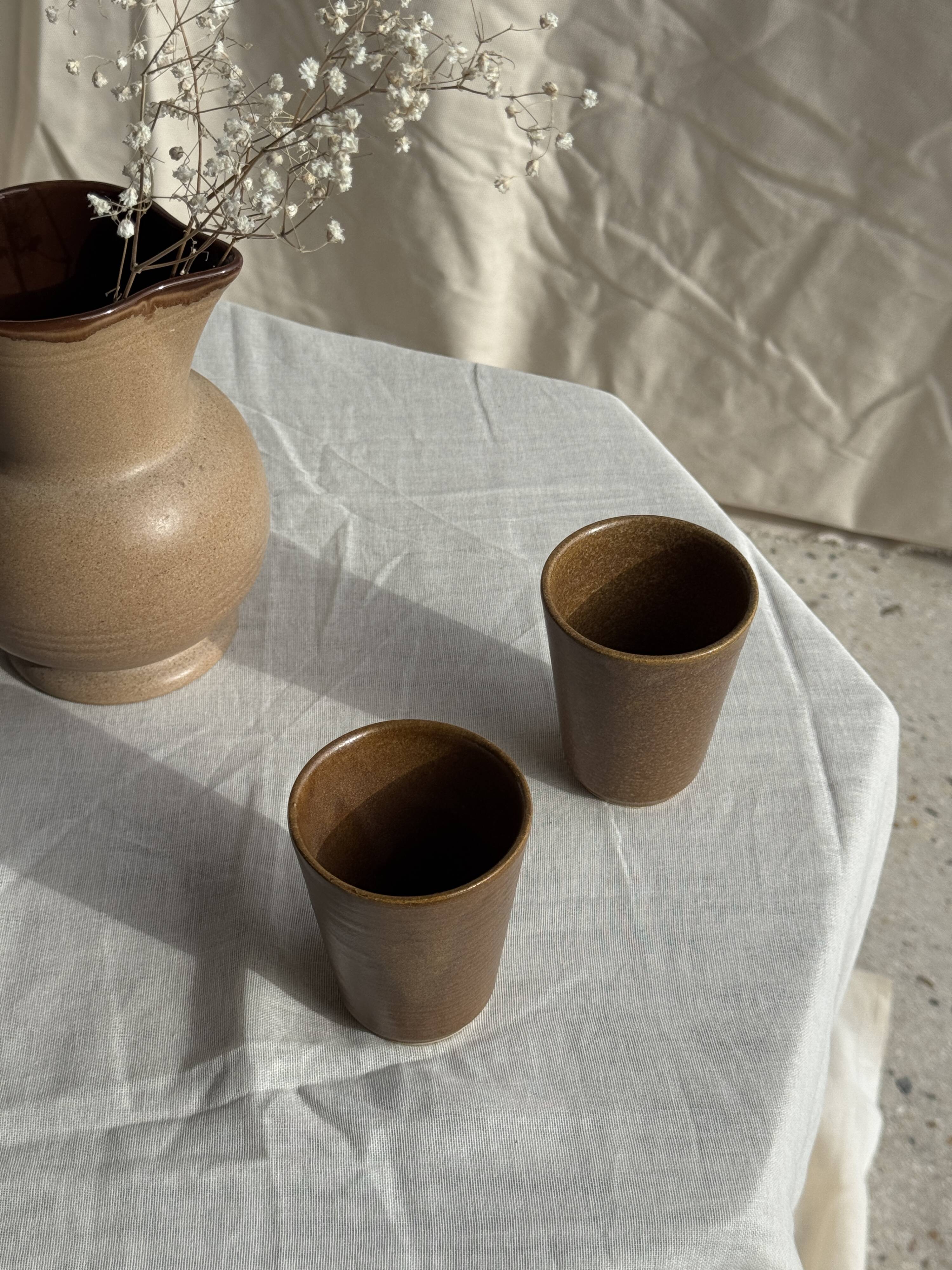 Set of 10 small stoneware mugs from Digoin.