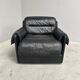 Black leather lounge chair by Dreipunkt, 1970s