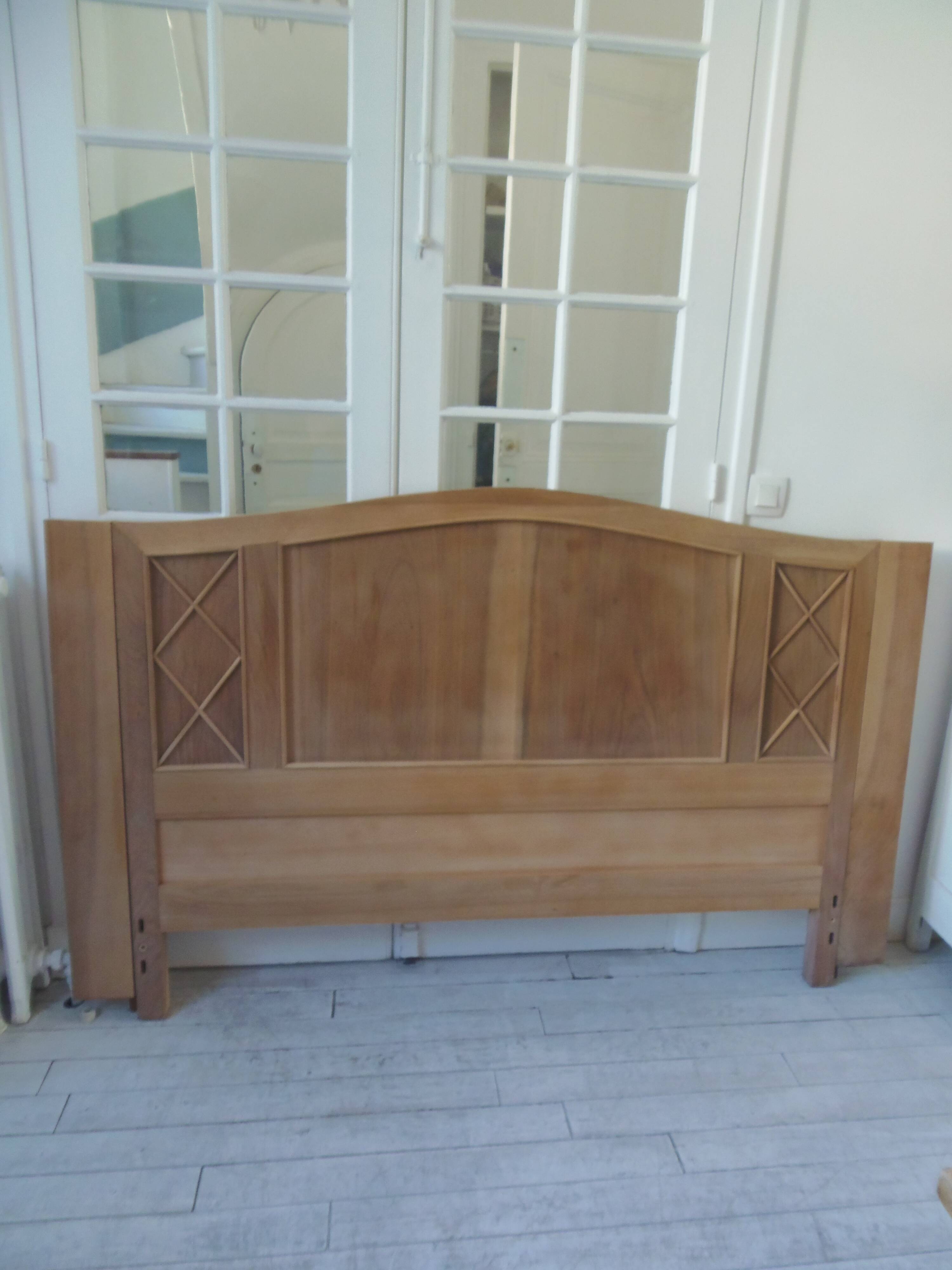 Headboard for a 160 bed in solid walnut with waxed finish.