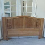Headboard for a 160 bed in solid walnut with waxed finish.