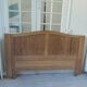 Headboard for a 160 bed in solid walnut with waxed finish.