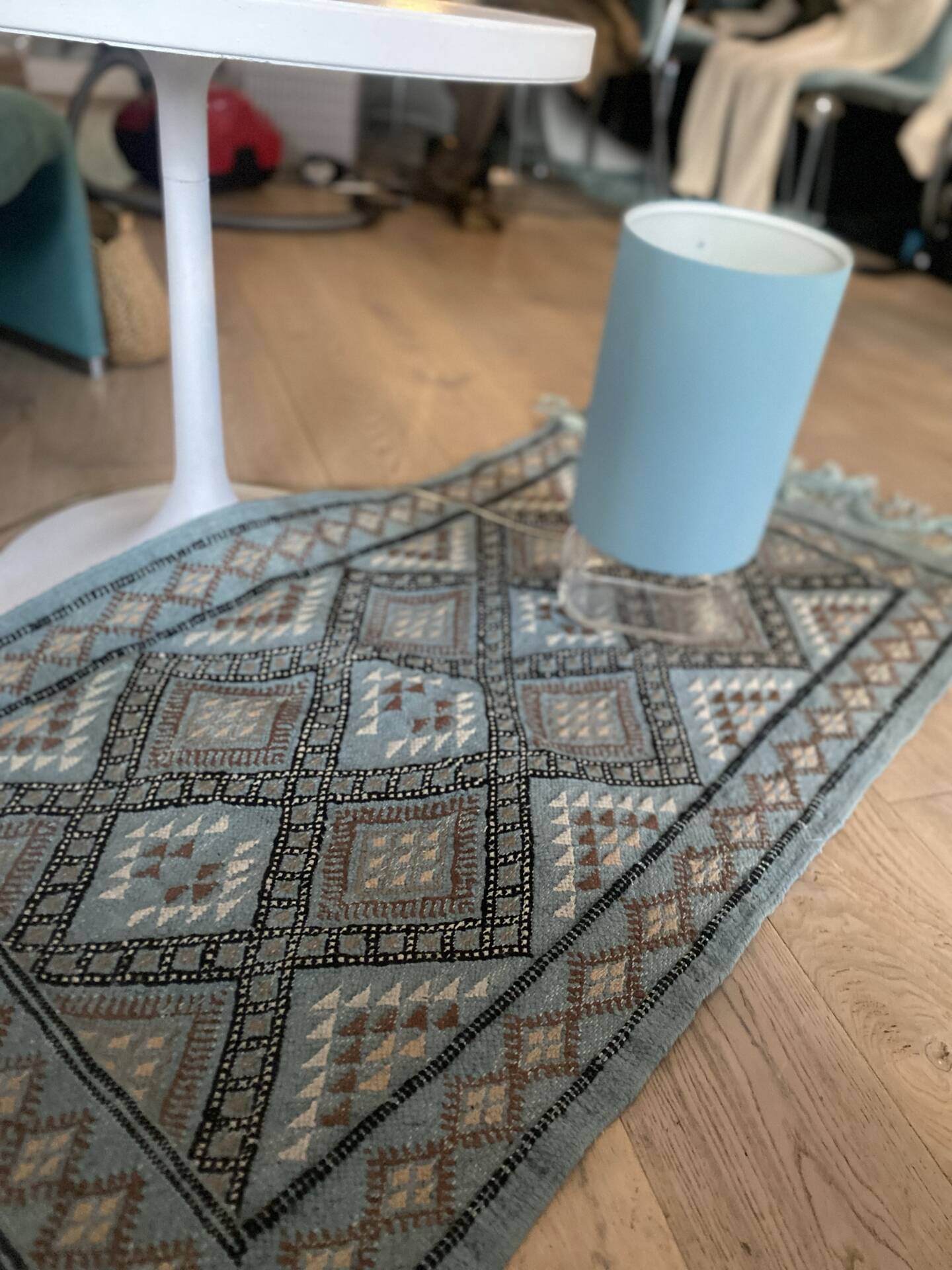 Handmade turquoise and beige wool rug, new.
