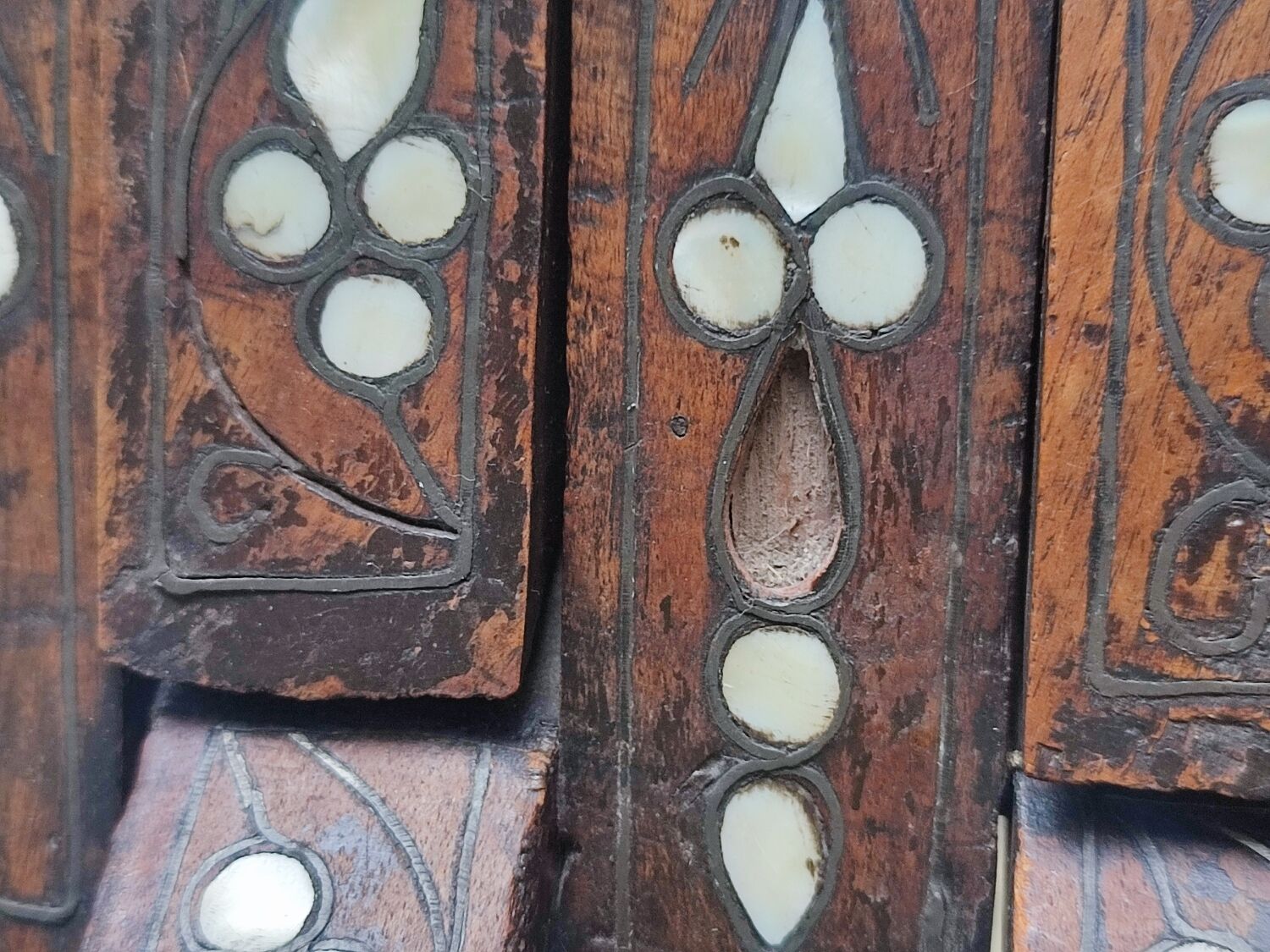 Antique folding oriental chair with mother-of-pearl inlays