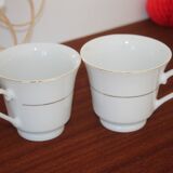 Set of 2 white porcelain cups with gold rim