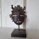 African bronze mask on pedestal, from Ivory Coast, dating