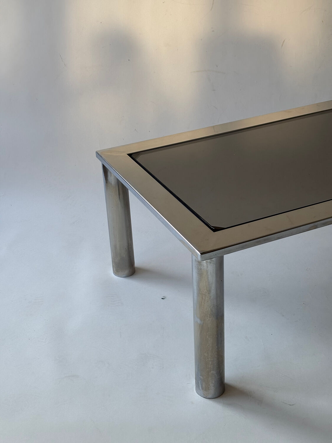 Chrome metal and smoked glass coffee table, 1970.