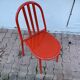 Chaise orange Robert Mallet Stevens, édition années 1980