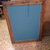 Mirror in golden wood