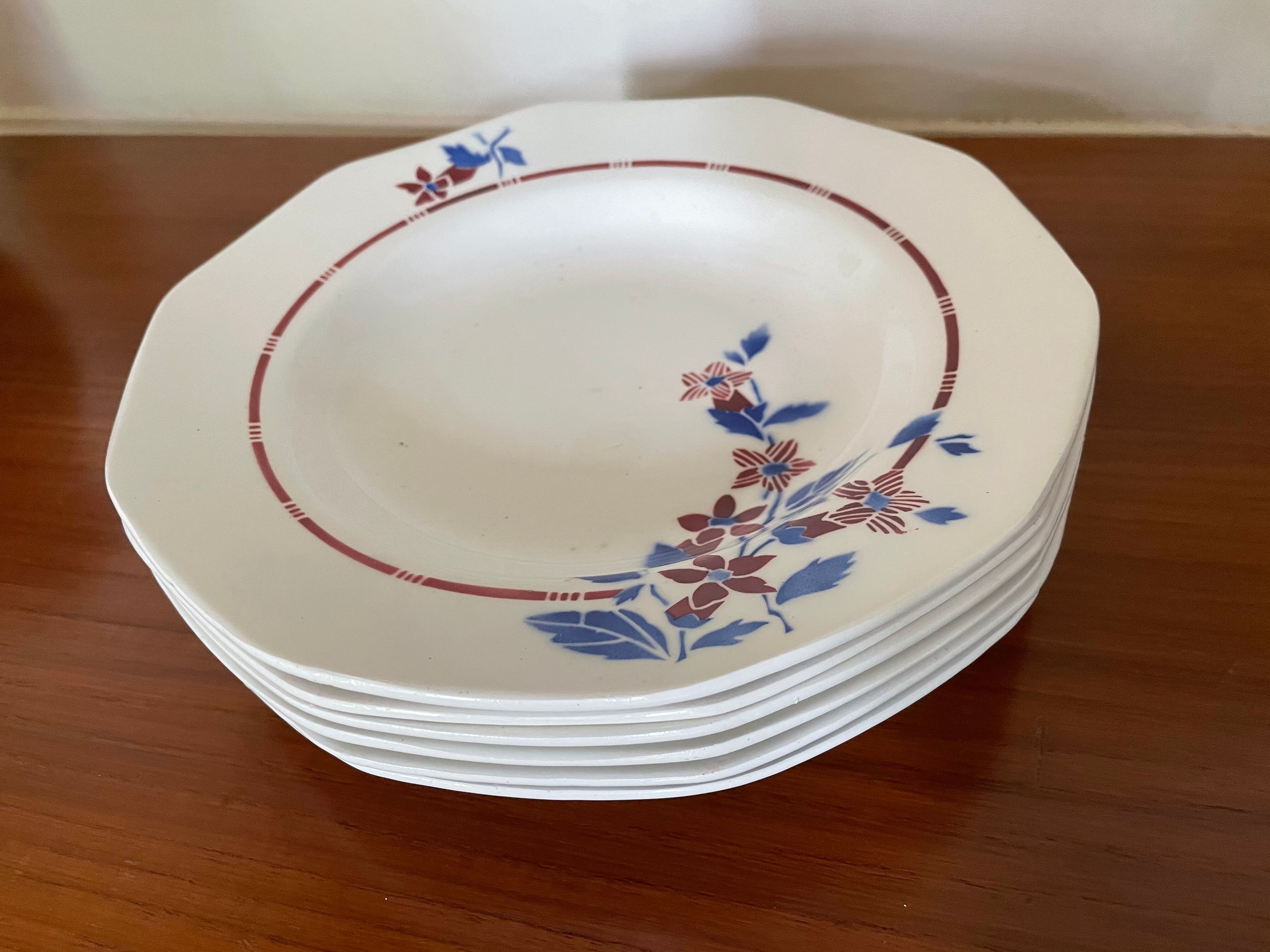 Saint Amand hollow plates decorated with red and blue flowers