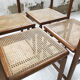 Lot de 4 chaises cannées années 50