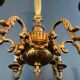 Lustre with 6 light arms in bronze in the Louis XVI style.