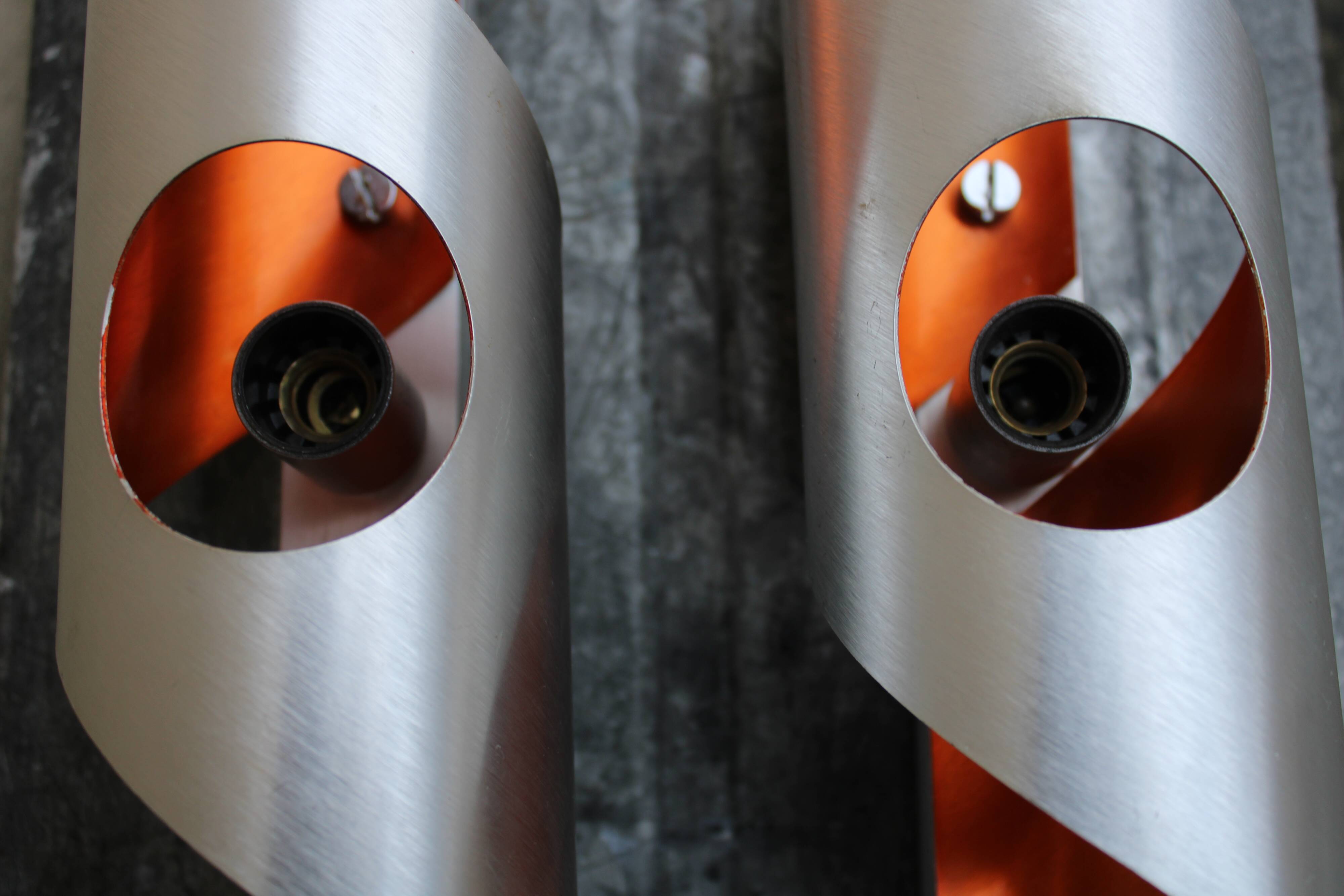 Pair of orange brushed aluminum wall light