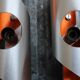 Pair of orange brushed aluminum wall light