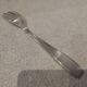 Silver-plated metal stew fork by Christofle silversmiths, Atlas model