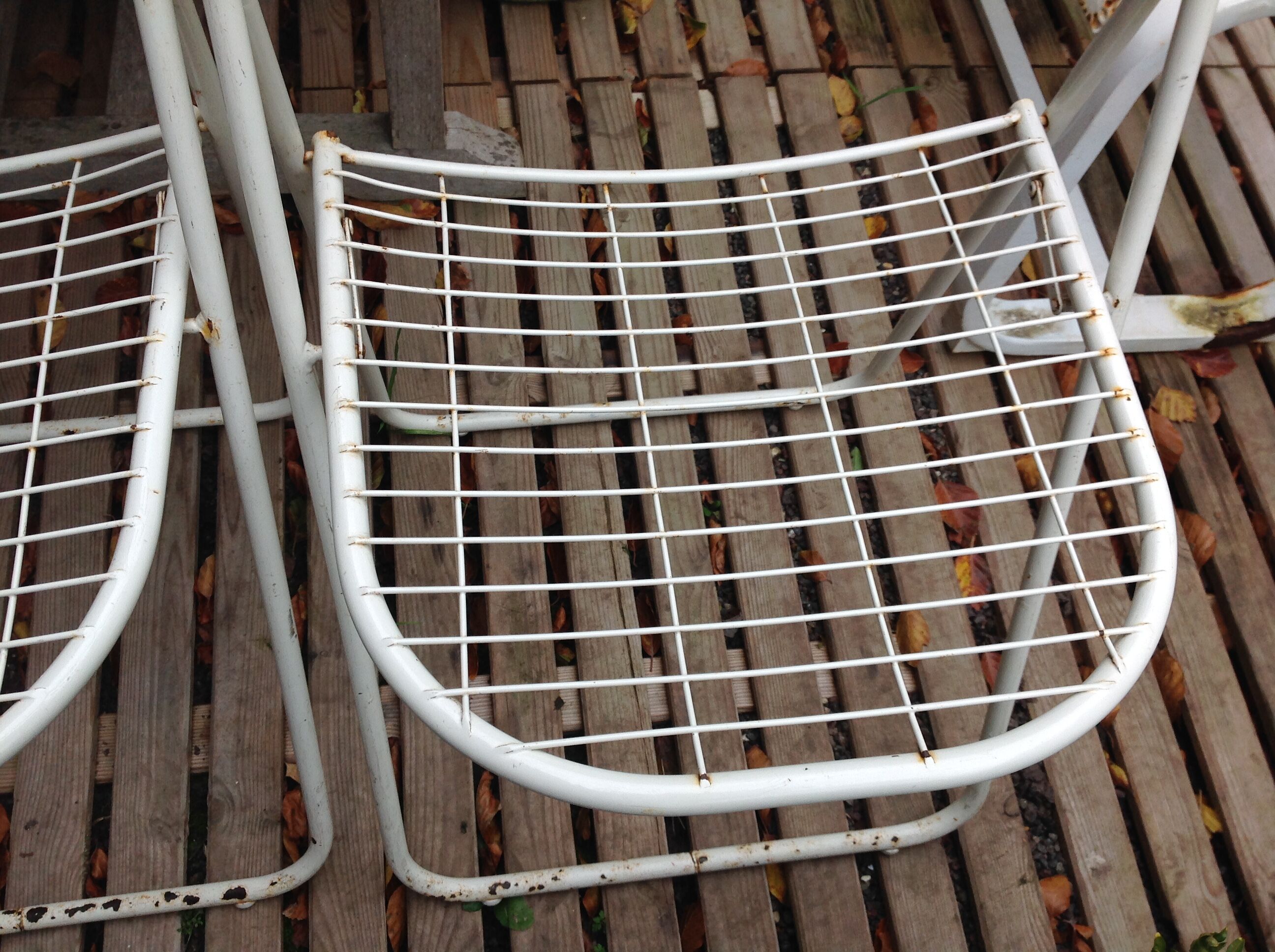 Trio of folding metal chairs