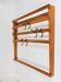Mid-century Carl Auböck coat rack in beech with 7 brass hooks, 1950s.