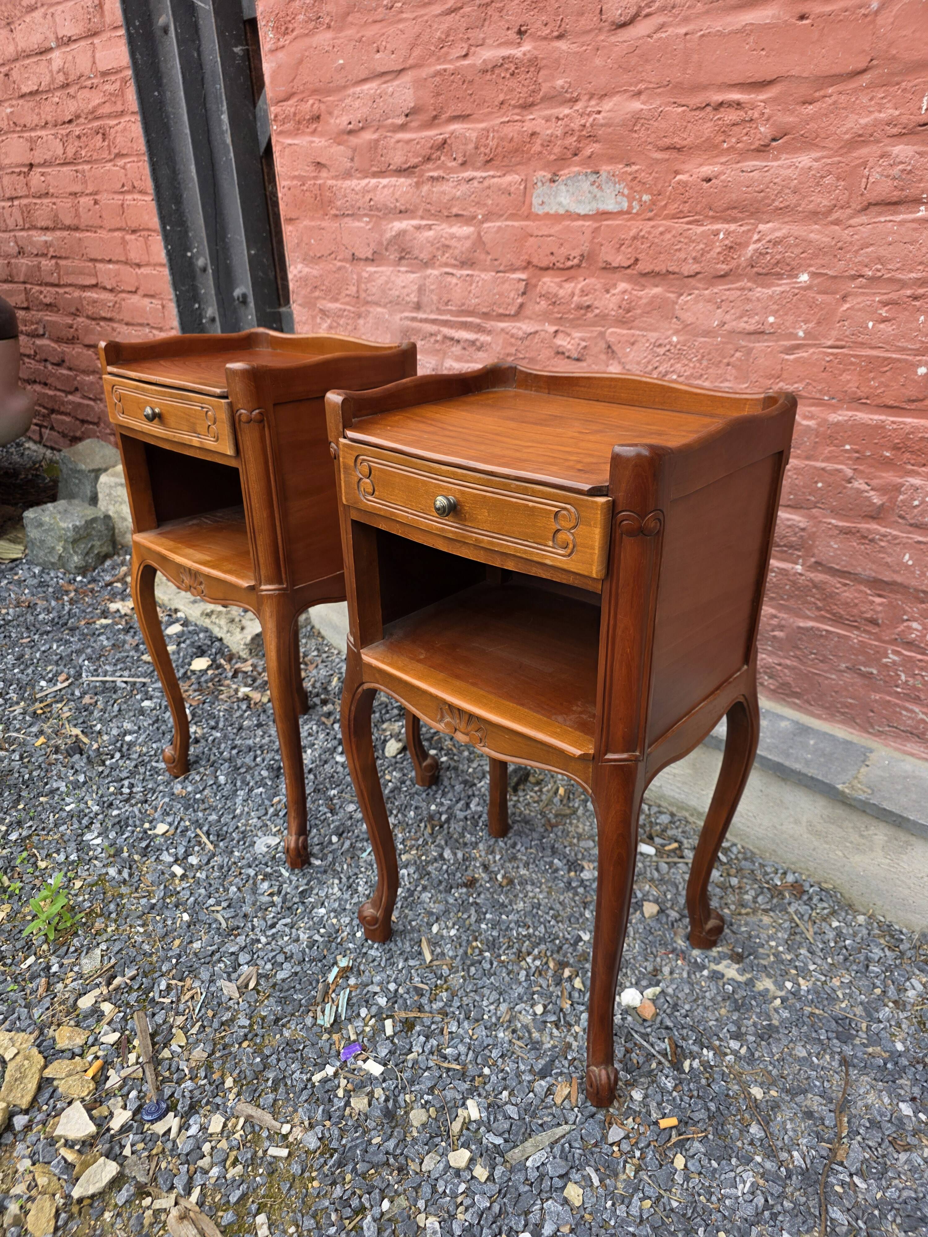 Pair of Louis XV style bedside tables in cherry wood.