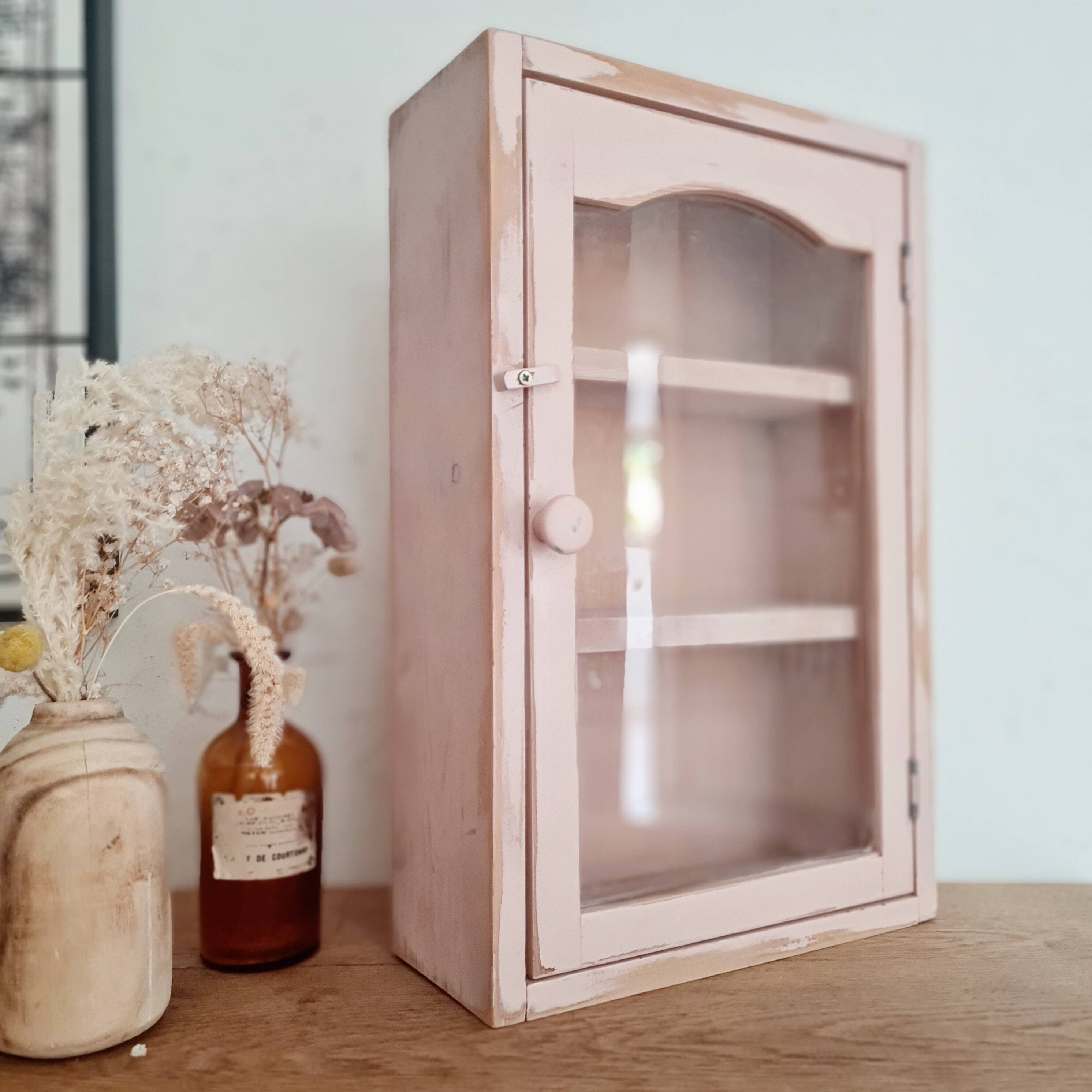 Medicine cabinet in patinated pink wood
