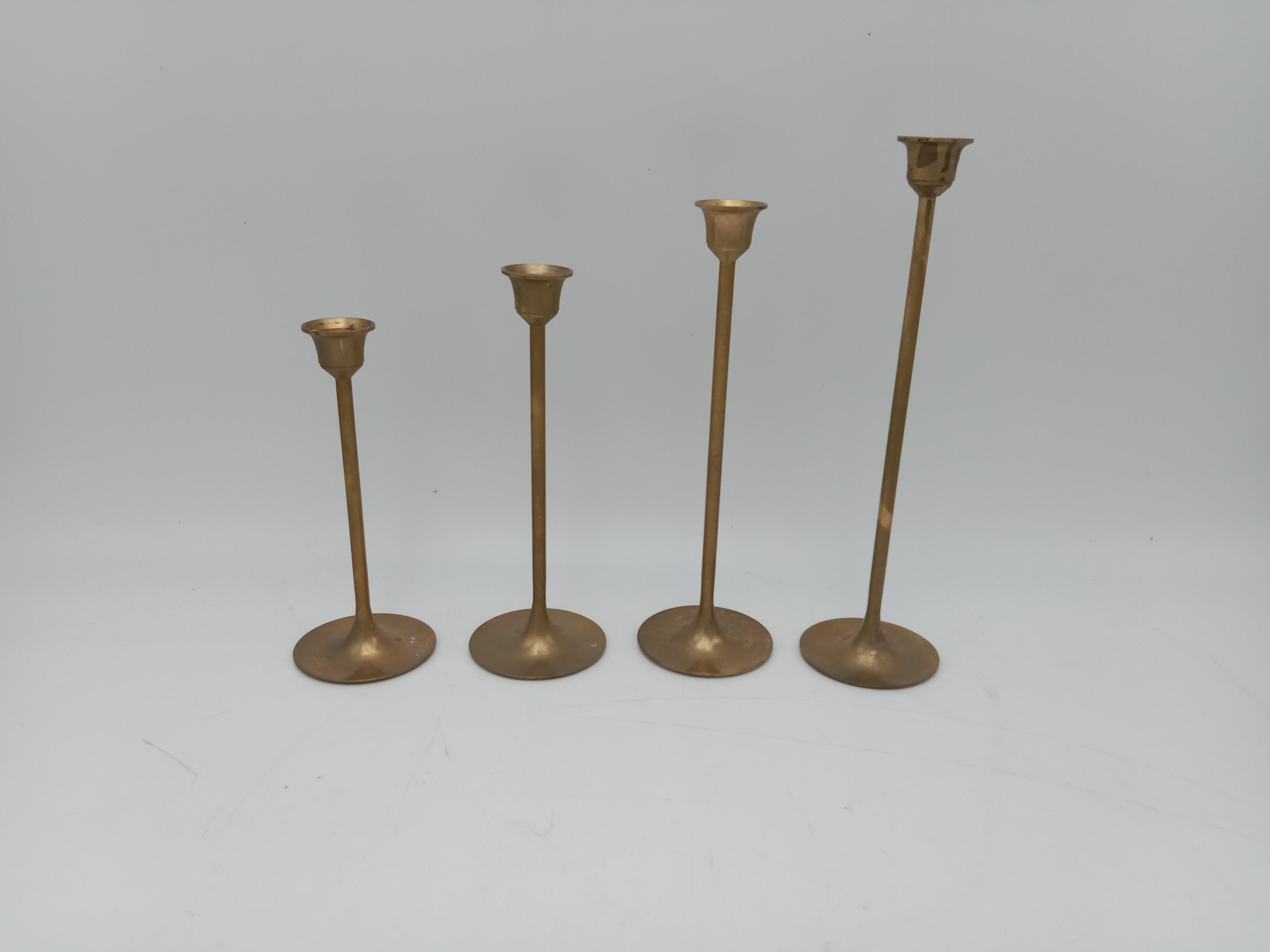 Series of 4 Scandinavian brass candle holders