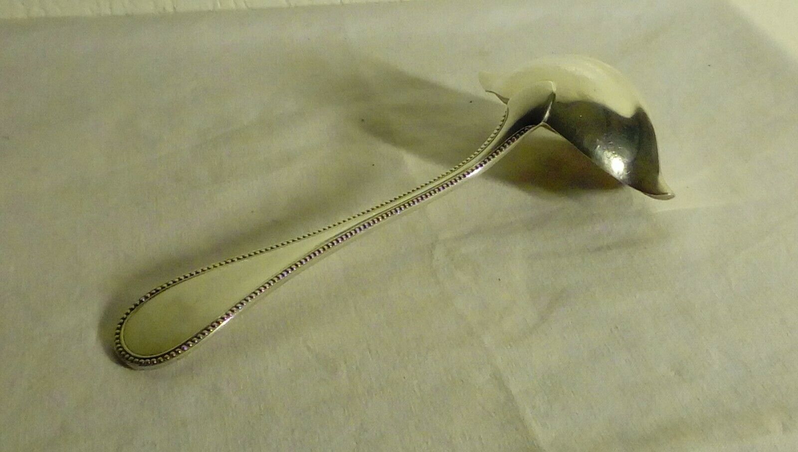 Cuillère en métal argenté Christofle modèle Perle