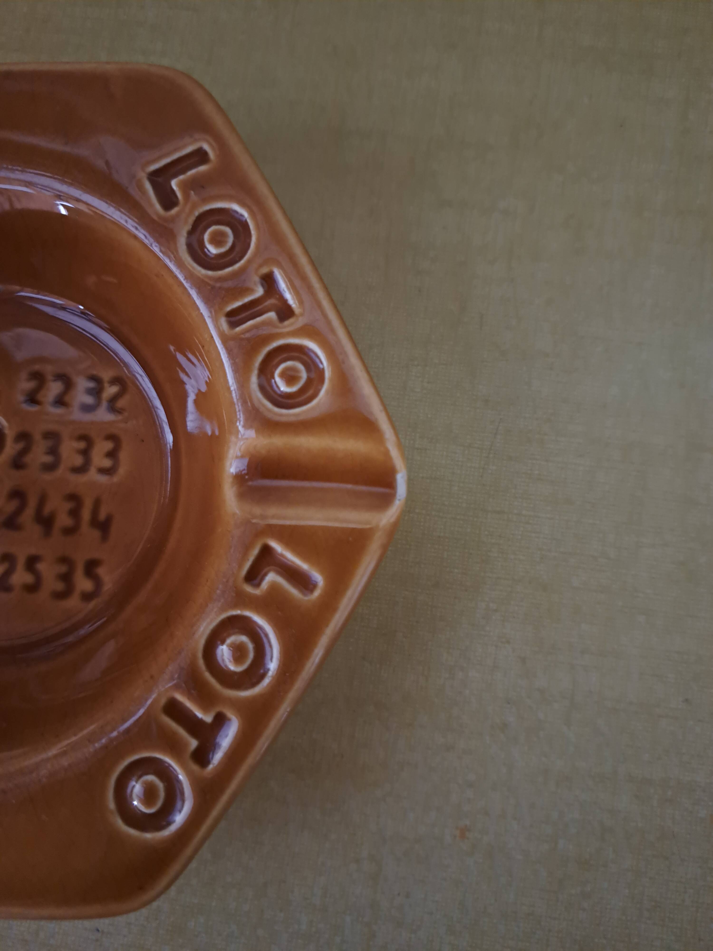 Vintage lotto advertising ashtray