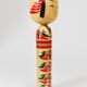 Decorative Kokeshi doll sculpture from northern Japan, hand-painted, signed.