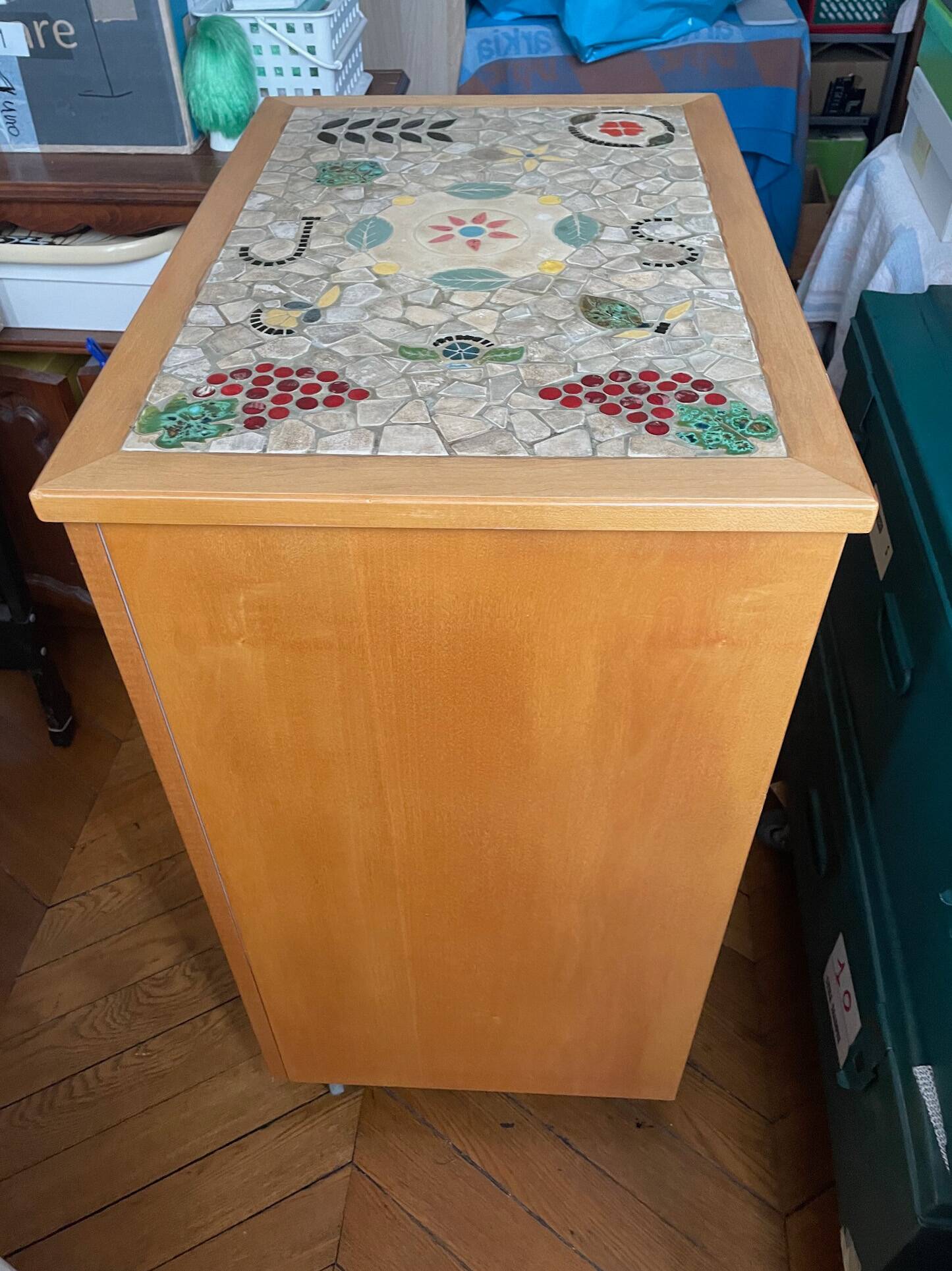 New oak storage furniture with a signed artisanal mosaic top.