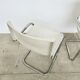 Pair of white moulded shell chairs with chrome tube — Space Age 70s