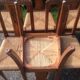 Série de 6 chaises rococo, paillées en noyer massif époque 1930.