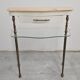 Paire de tables de chevet Hollywood Regency en bronze avec dessus en marbre