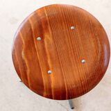 Vintage low stool with star base and pagholz seat