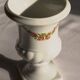 Médicis vase with floral decoration, made of Limoges porcelain.