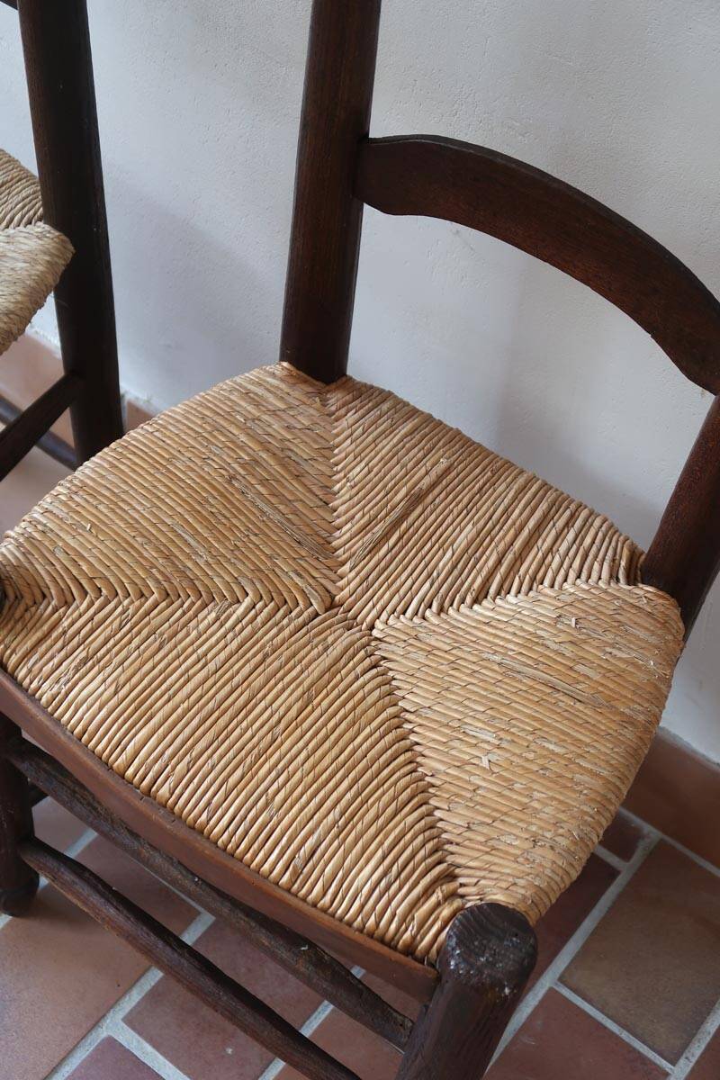 Pair of straw farm chairs