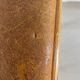 Vintage stool from the 60s with aged leather seat
