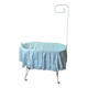 Wrought iron crib painted white from around 1920 with bedding.