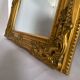 Miroir biseauté style empire doré 64x54cm