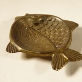 Empty pocket "fish" in golden metal