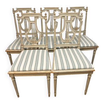Suite de 5 chaises en hêtre style Louis XVI