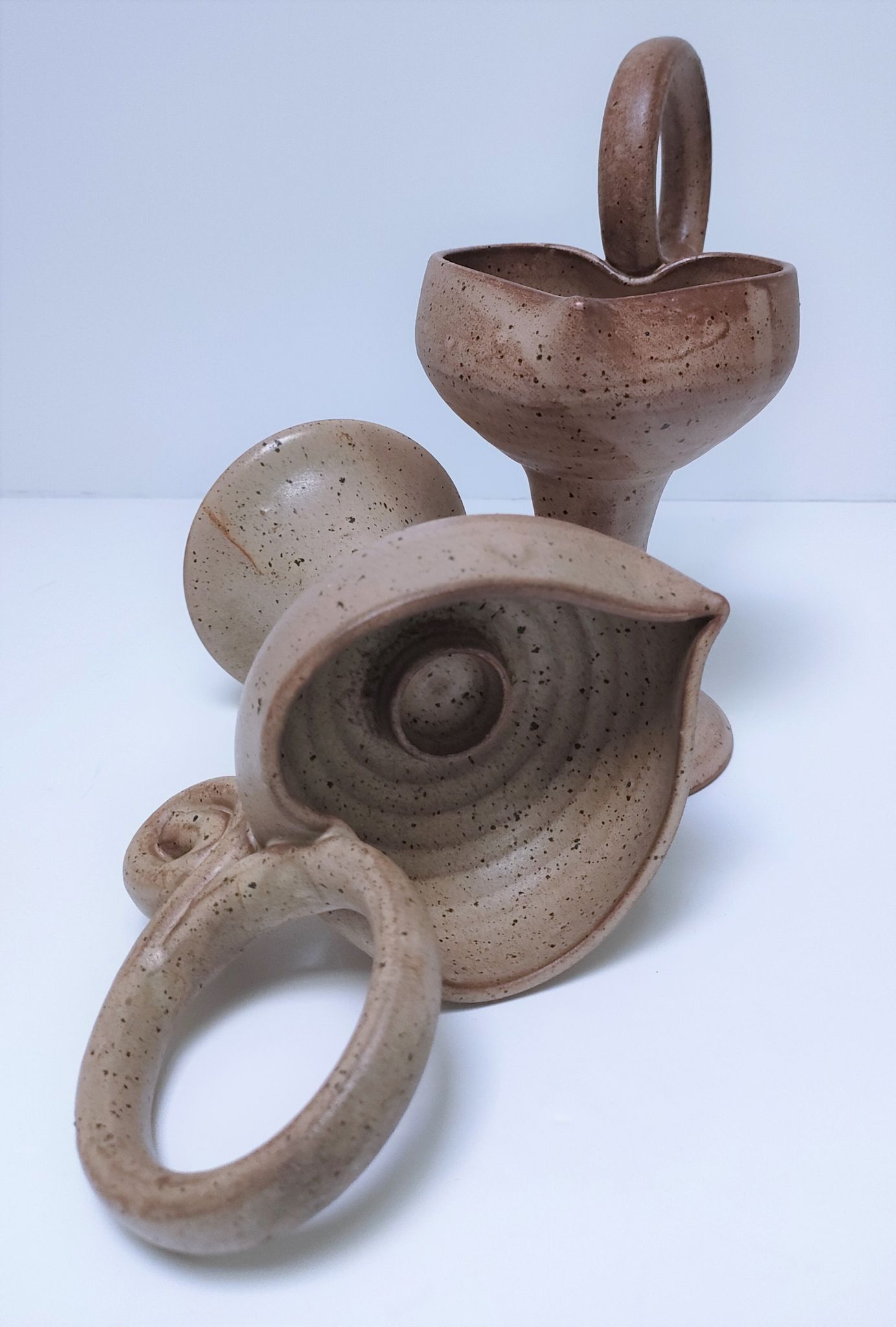 Pair of vintage “heart” sandstone candlesticks