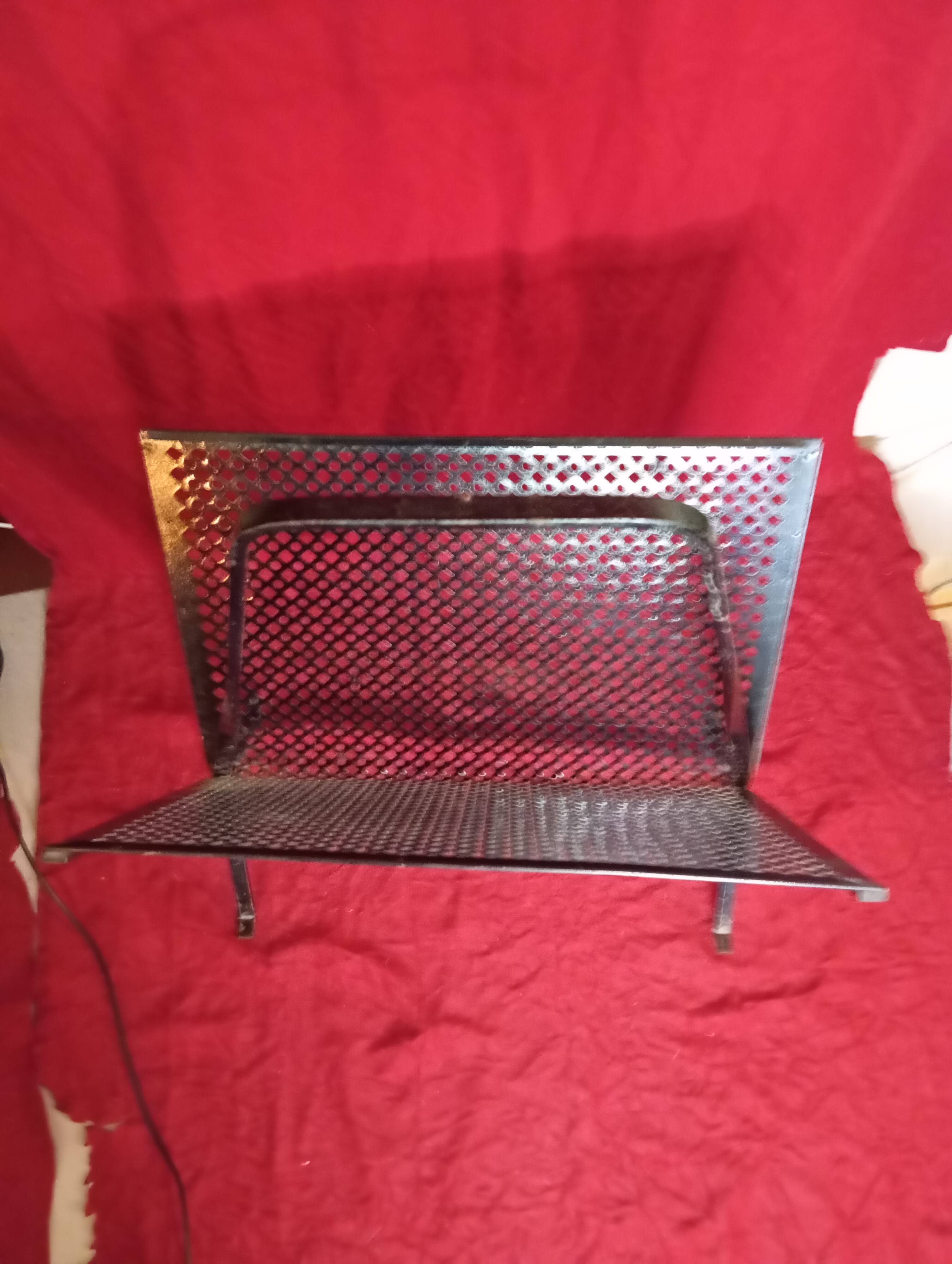 Vintage wrought iron magazine rack