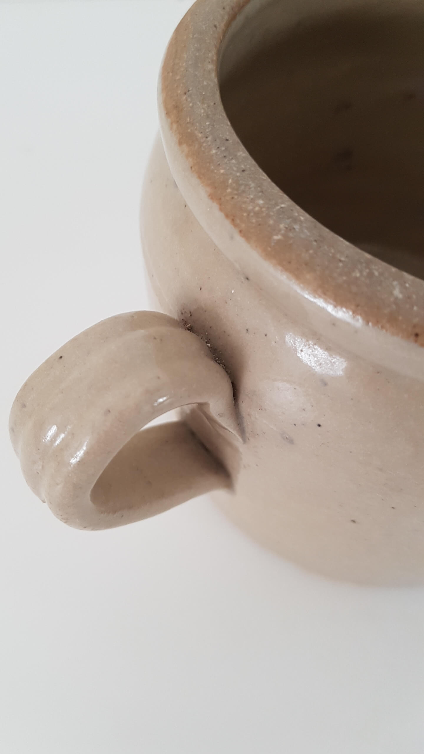 Old terracotta butterpot