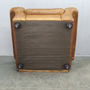 Paire de fauteuils lounge en cuir buffle cognac Arcon Italia